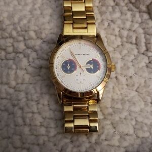 Geoffrey Beene Gold Watch with White and Multicolor Dial